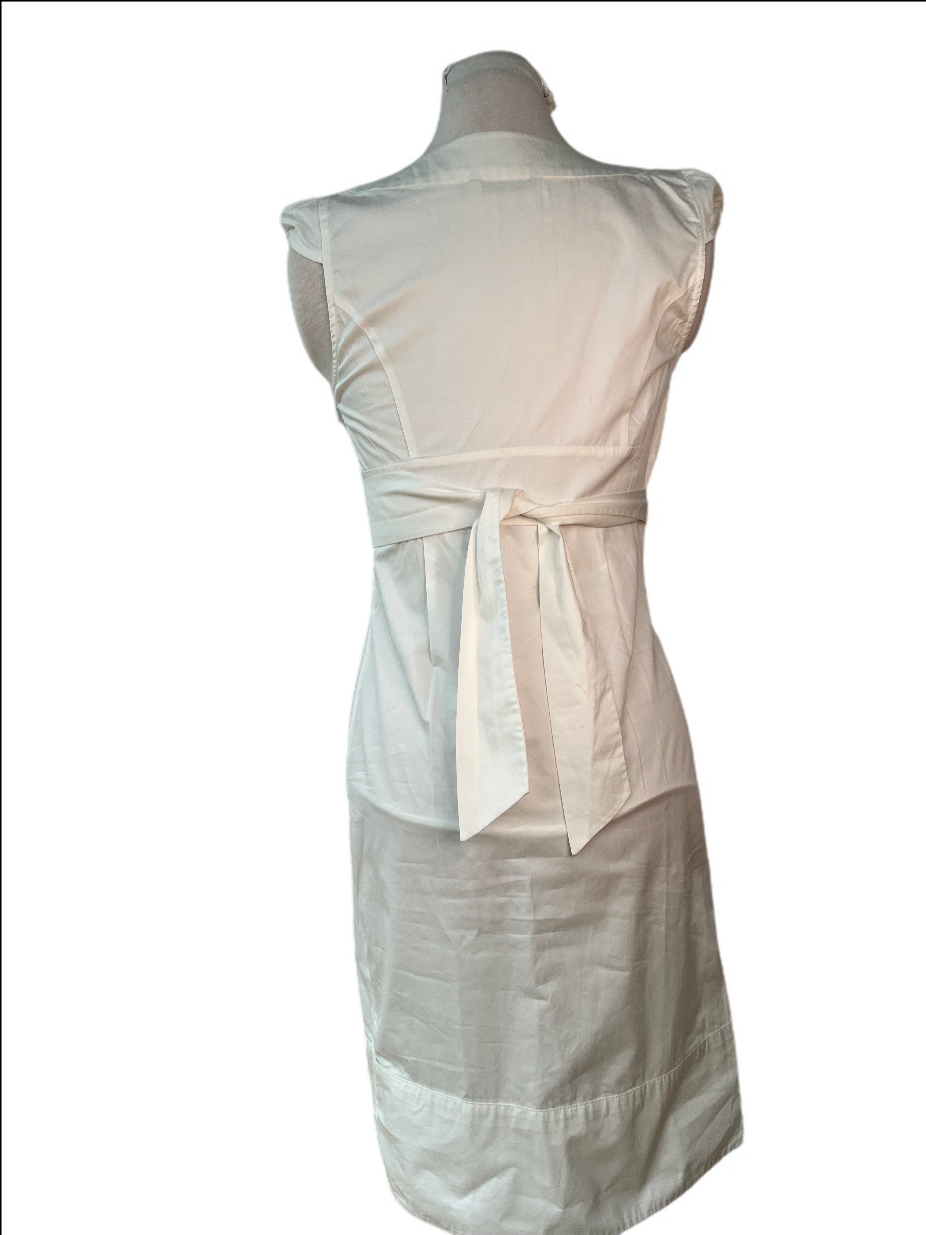 Sleeveless Sheath Dress with belt detail
