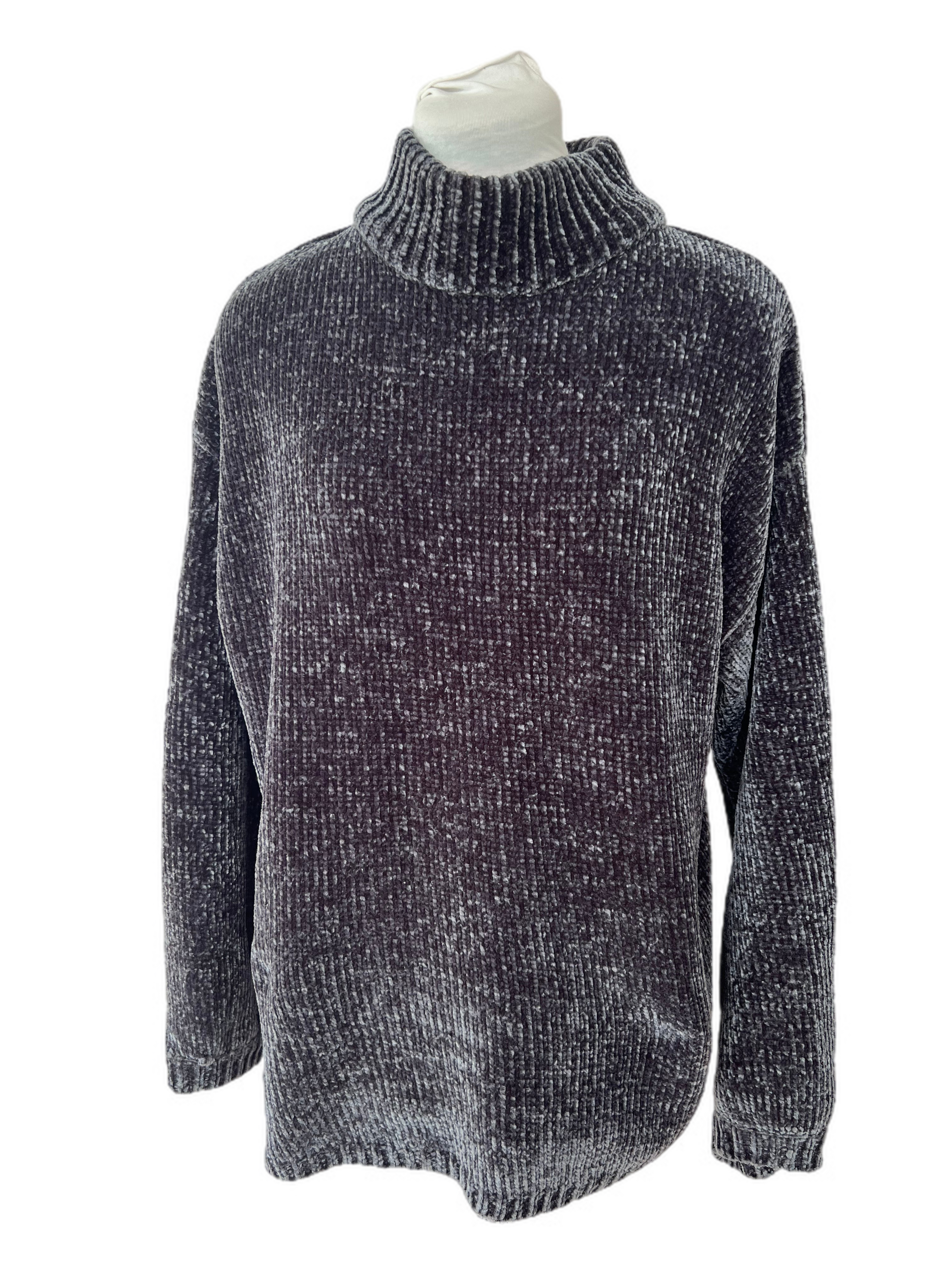 Polo neck knit jumper with button detail at sleeves some piling