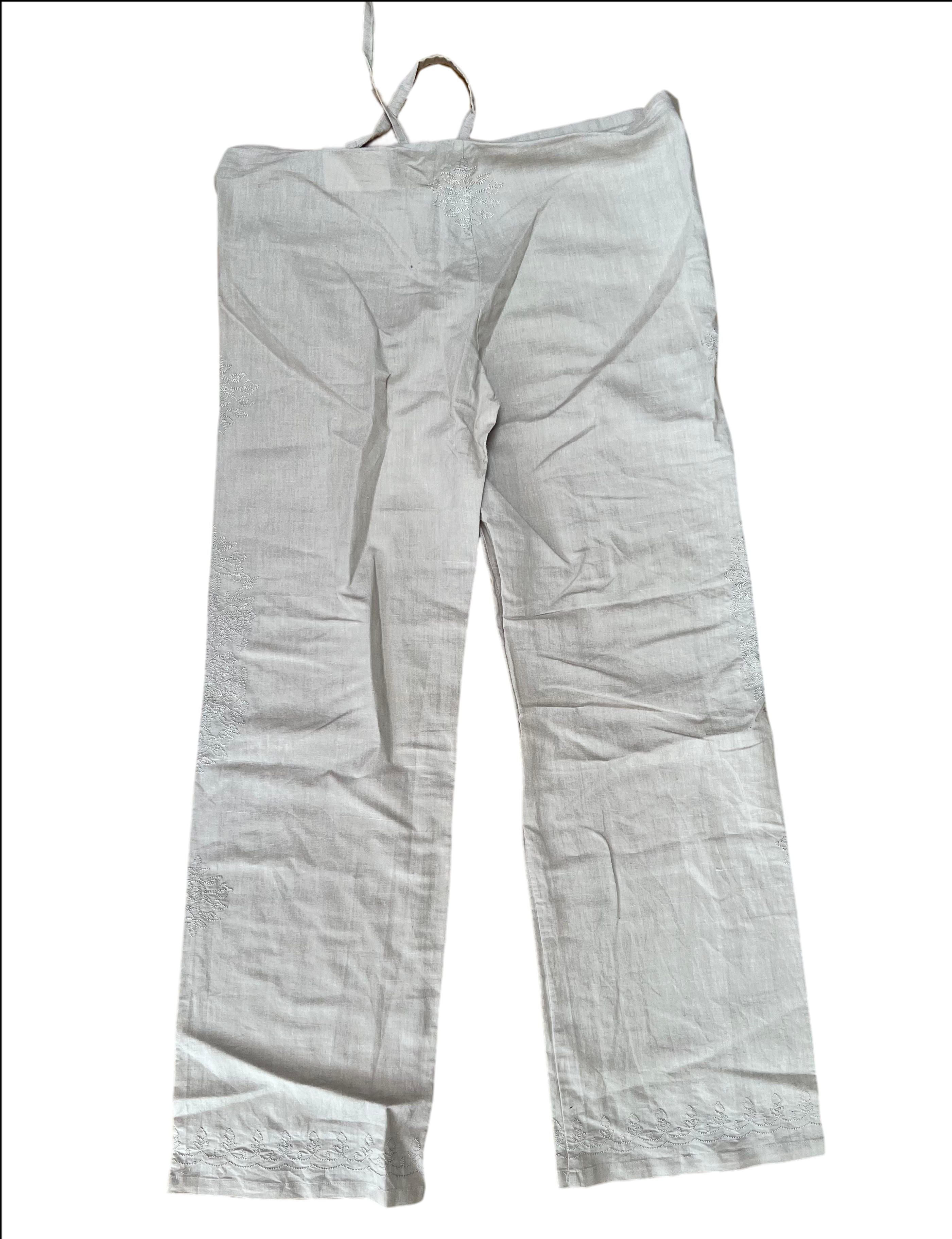 Drawstring pants with embroidery details